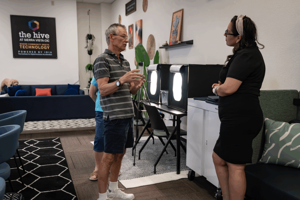A Digital Navigator in conversation with an attendee