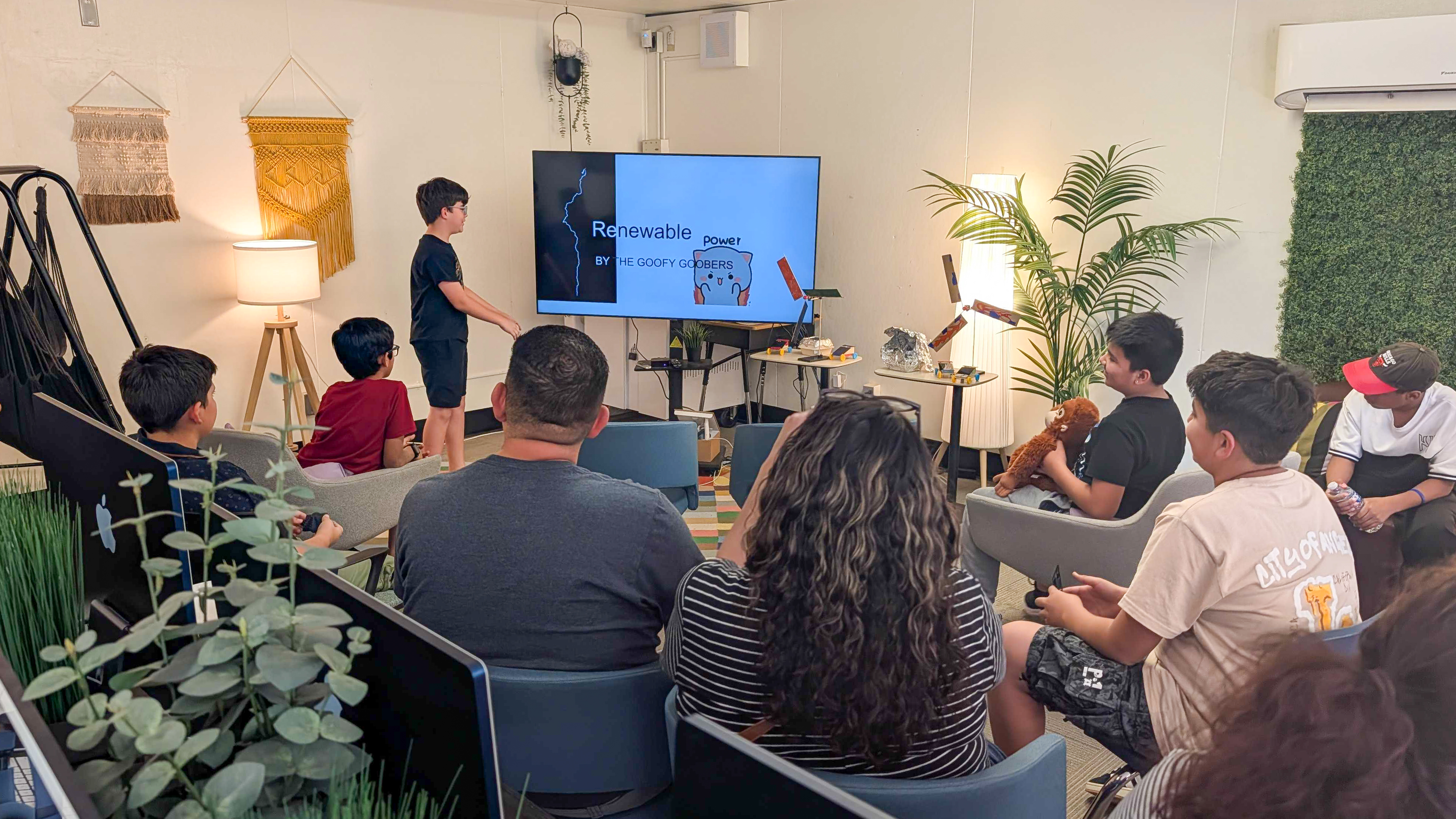 A camper presents to a captivated audience